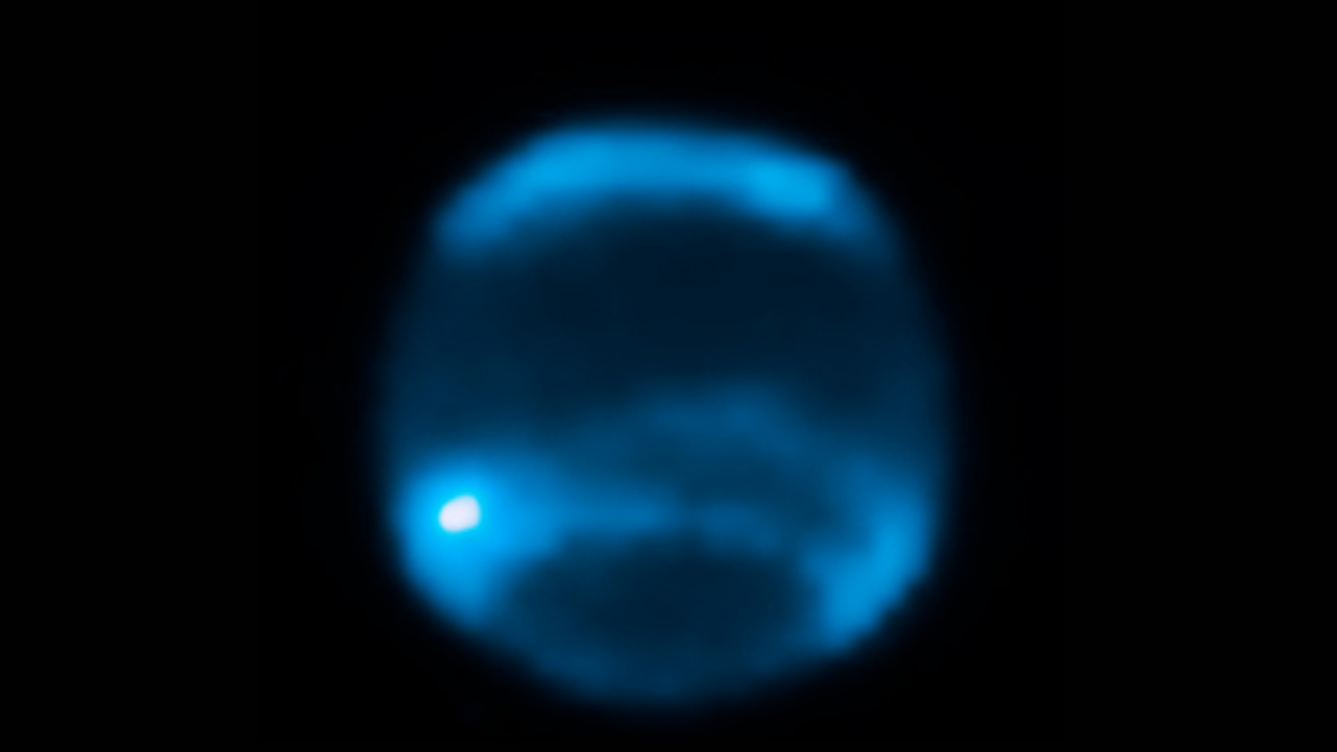 Gambar buram neptunus, bergaris-garis tebal berwarna biru dan biru tua.