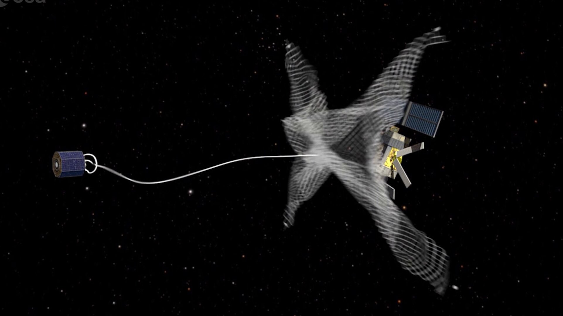 sebuah pesawat ruang angkasa menembakkan jaring yang ditambatkan ke sepotong sampah logam di luar angkasa